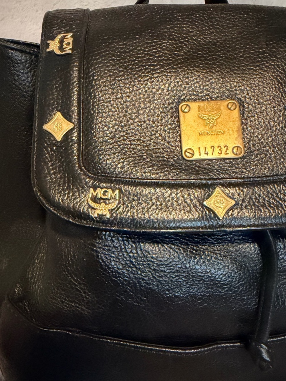 MCM Black Leather Backpack with Gold Logo Accents - Picture 7 of 11